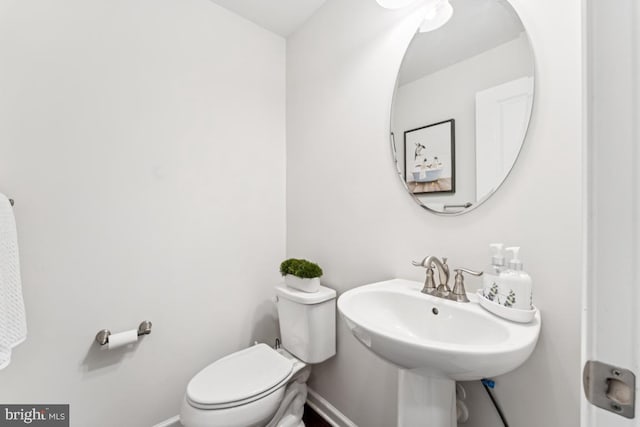 14302 Hidden Forest Dr, Accokeek, MD 20607 - bathroom featuring toilet and baseboards