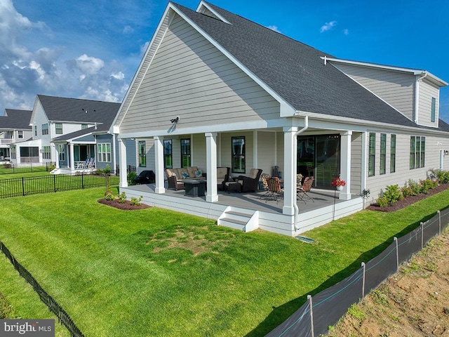 33016 Ethan Allen Dr, Rehoboth Beach, DE 19971 - rear view of house featuring an outdoor living space and roof with shingles