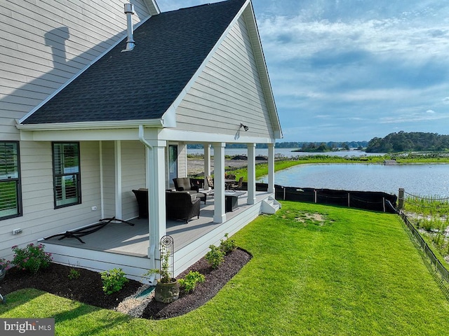 33016 Ethan Allen Dr, Rehoboth Beach, DE 19971 - view of yard featuring a deck with water view