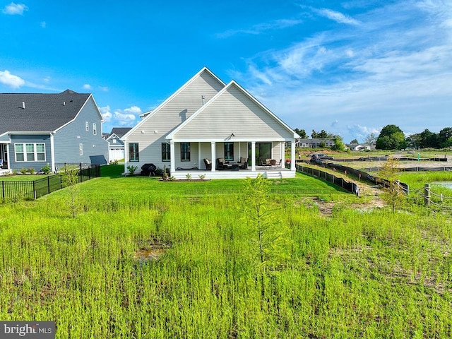 33016 Ethan Allen Dr, Rehoboth Beach, DE 19971 - back of house with a patio
