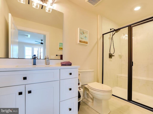 33016 Ethan Allen Dr, Rehoboth Beach, DE 19971 - full bathroom featuring toilet, a stall shower, vanity, recessed lighting, and ceiling fan