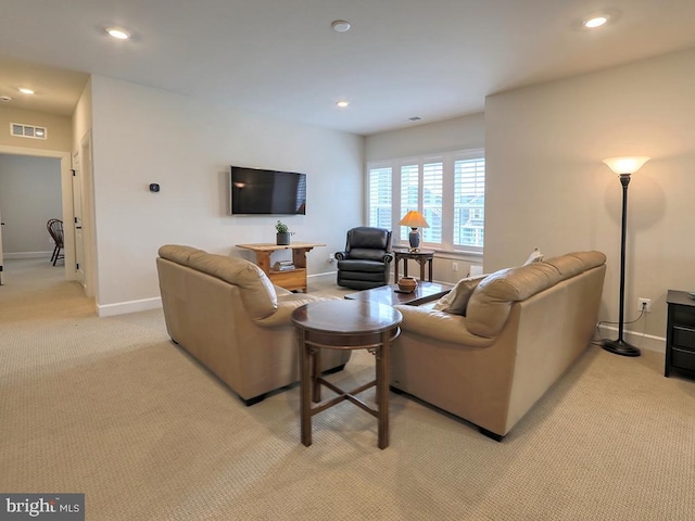 33016 Ethan Allen Dr, Rehoboth Beach, DE 19971 - living area featuring light colored carpet, baseboards, and recessed lighting