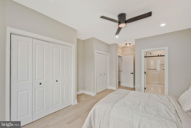 1713 4th St NW, Washington, DC 20001 - bedroom featuring light wood-style floors, multiple closets, baseboards, ensuite bath, and recessed lighting