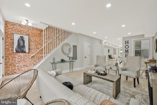 1713 4th St NW, Washington, DC 20001 - living room featuring wood finished floors, recessed lighting, baseboards, and brick wall