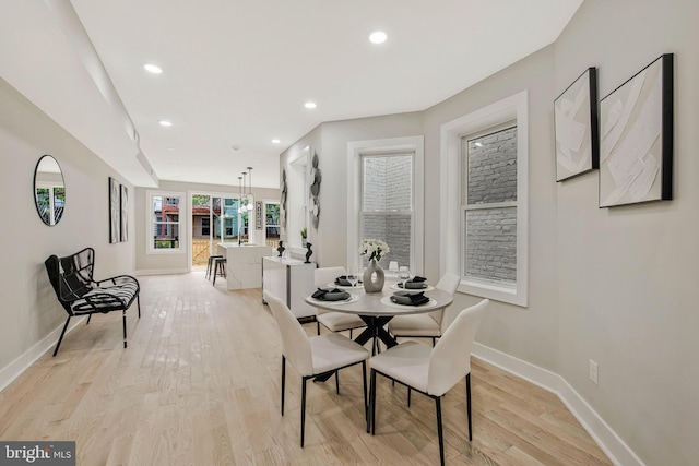 1713 4th St NW, Washington, DC 20001 - dining space featuring baseboards, light wood-type flooring, and recessed lighting