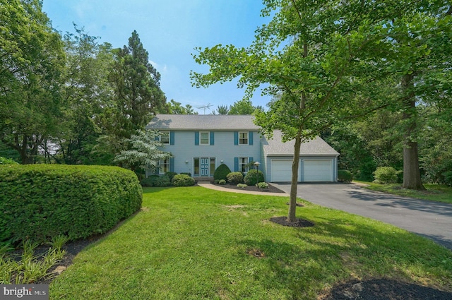 2640 Breezewood Dr, Lancaster, PA 17601 - colonial home featuring driveway, a front yard, and a garage
