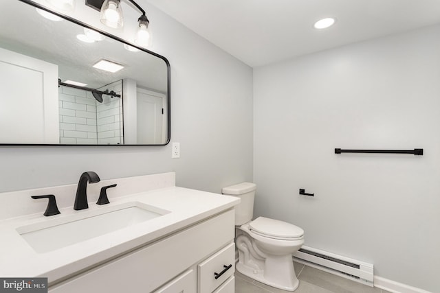 434 Bunker Hill Rd, Halifax, PA 17032 - bathroom with baseboard heating, vanity, tile patterned flooring, toilet, and a shower
