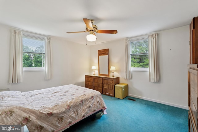 909 Rocklynn Rd, Springfield, PA 19064 - bedroom featuring multiple windows, carpet flooring, and a ceiling fan