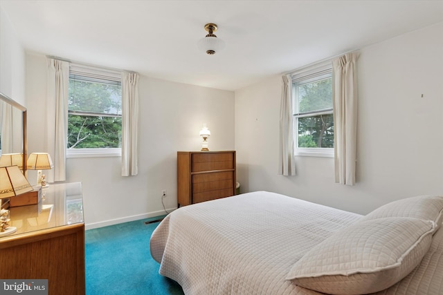 909 Rocklynn Rd, Springfield, PA 19064 - carpeted bedroom featuring baseboards