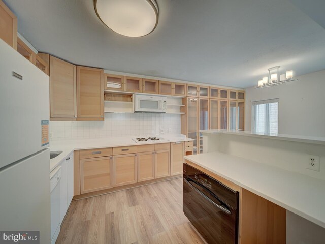 5017 7th Rd S Unit 101, Arlington, VA 22204 - kitchen featuring white appliances, open shelves, light wood-type flooring, and light brown cabinets