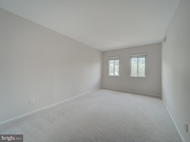 5017 7th Rd S Unit 101, Arlington, VA 22204 - carpeted spare room with baseboards