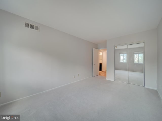 5017 7th Rd S Unit 101, Arlington, VA 22204 - unfurnished bedroom with a closet, carpet, and baseboards
