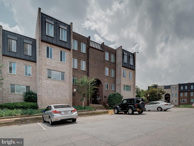 5017 7th Rd S Unit 101, Arlington, VA 22204 - view of building exterior with uncovered parking