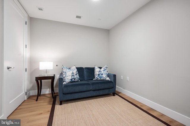 801 N Fairfax St Unit 314, Alexandria, VA 22314 - sitting room featuring light wood-style flooring and baseboards
