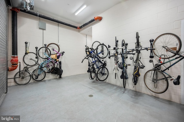 801 N Fairfax St Unit 314, Alexandria, VA 22314 - garage with bike storage and concrete block wall