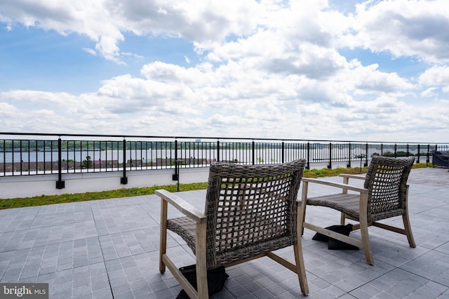 801 N Fairfax St Unit 314, Alexandria, VA 22314 - view of patio with a water view
