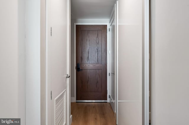 801 N Fairfax St Unit 314, Alexandria, VA 22314 - hallway featuring wood finished floors