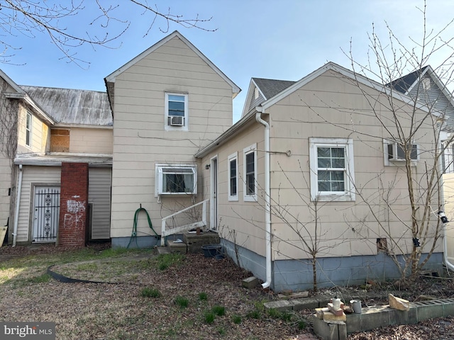 27 W David St, Frederica, DE 19946 - rear view of house with crawl space and cooling unit
