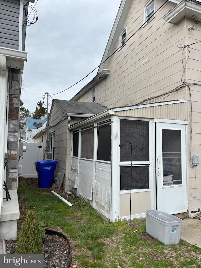 27 W David St, Frederica, DE 19946 - view of home's exterior with a sunroom
