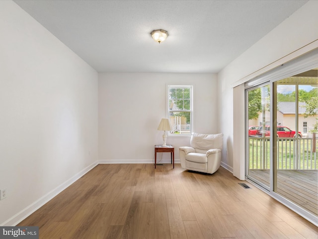 2 Assawoman Ave, Ocean View, DE 19970 - sitting room featuring light wood-style flooring and baseboards