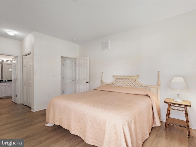 2 Assawoman Ave, Ocean View, DE 19970 - bedroom with wood finished floors and connected bathroom