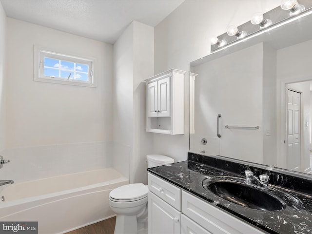 2 Assawoman Ave, Ocean View, DE 19970 - bathroom featuring a garden tub, vanity, and wood finished floors