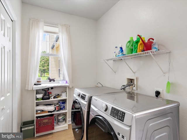 2 Assawoman Ave, Ocean View, DE 19970 - laundry room with washer and dryer and light wood-style floors