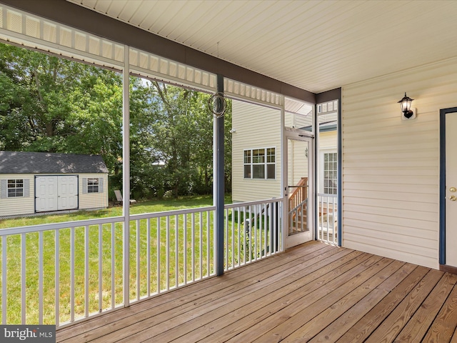 2 Assawoman Ave, Ocean View, DE 19970 - wooden deck with a storage shed and a lawn
