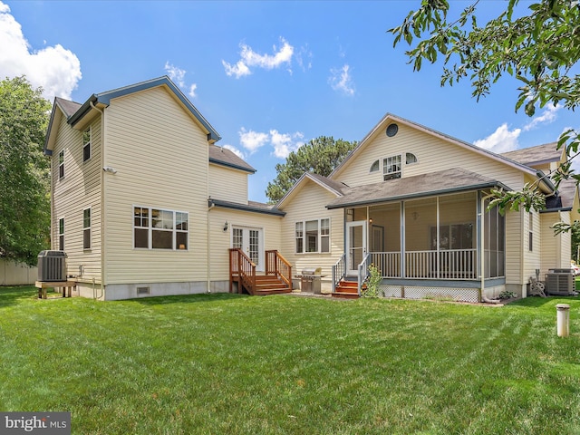 2 Assawoman Ave, Ocean View, DE 19970 - back of house featuring a yard, a sunroom, and french doors