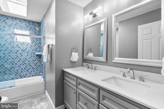 12407 Rousseau Ter, North Potomac, MD 20878 - bathroom with enclosed tub / shower combo, double vanity, and marble look tiles