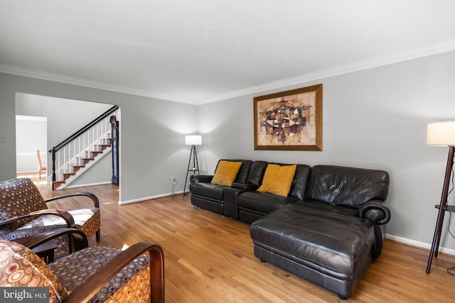 12407 Rousseau Ter, North Potomac, MD 20878 - living room featuring crown molding, light wood finished floors, and stairs