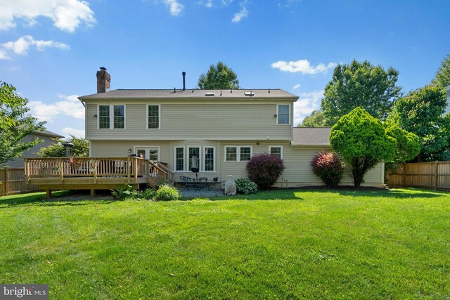 12407 Rousseau Ter, North Potomac, MD 20878 - rear view of property with a wooden deck and a chimney