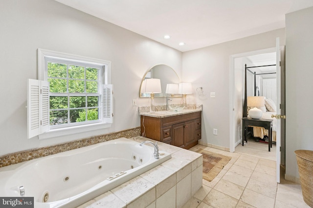 2085 Cobblestone Ln, Reston, VA 20191 - bathroom featuring vanity, a tub with jets, and recessed lighting