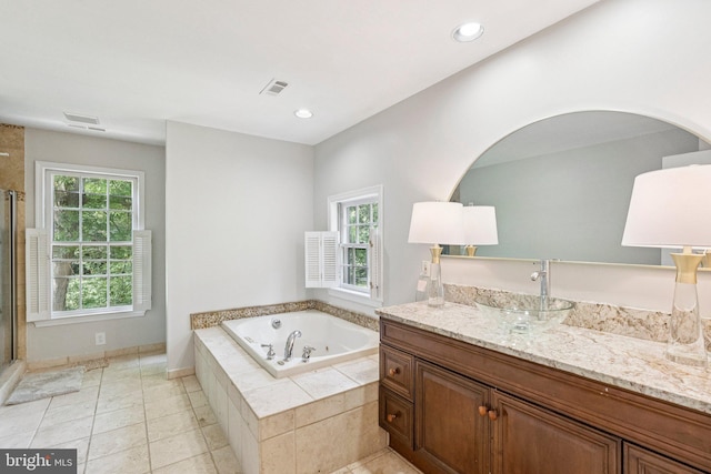 2085 Cobblestone Ln, Reston, VA 20191 - bathroom with vanity, a jetted tub, a shower stall, tile patterned flooring, and recessed lighting