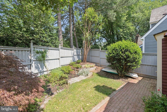 2085 Cobblestone Ln, Reston, VA 20191 - fenced backyard featuring a garden