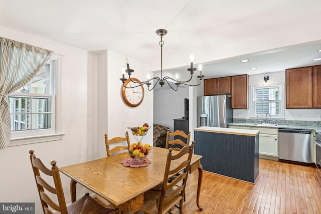 2085 Cobblestone Ln, Reston, VA 20191 - dining room with a chandelier, light wood-style floors, and recessed lighting