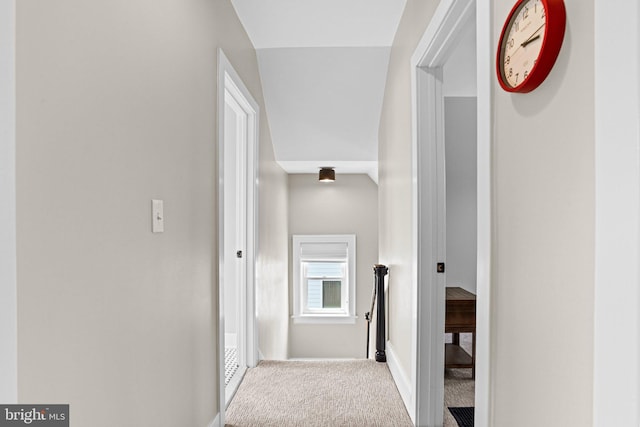 506 W High St, Carlisle, PA 17013 - hallway featuring carpet floors, baseboards, and an upstairs landing
