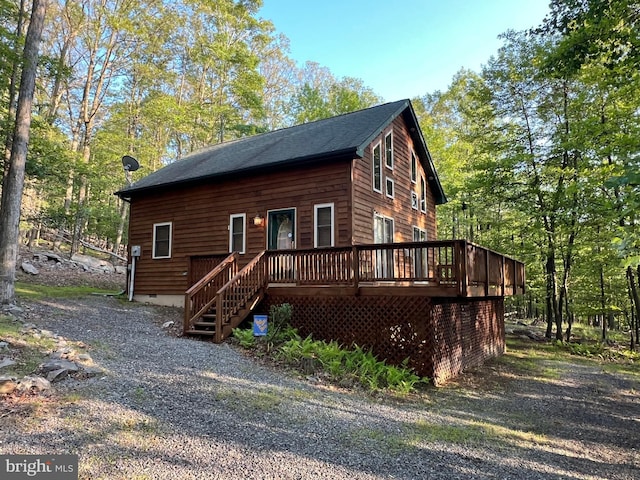 1000 Cardinal View Rd, Paw Paw, WV 25434 - view of front of house with a deck, a shingled roof, stairway, and crawl space