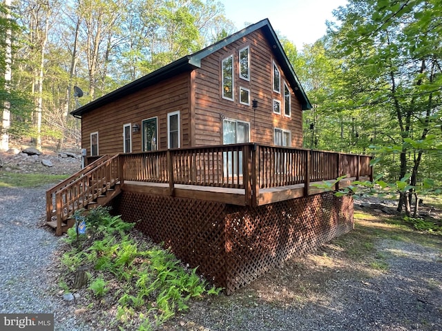 1000 Cardinal View Rd, Paw Paw, WV 25434 - view of home's exterior with a deck and stairs