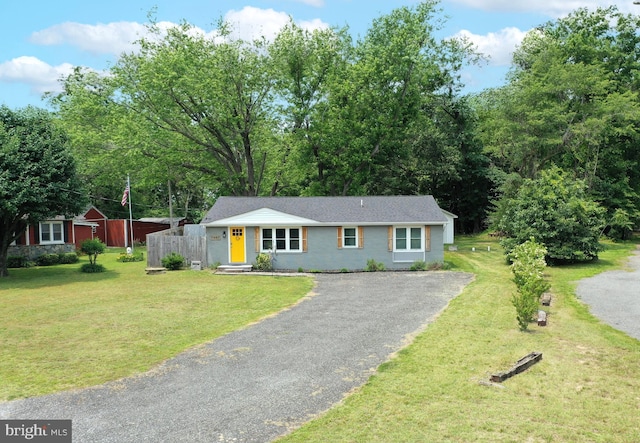 11487 Hg Trueman Rd, Lusby, MD 20657 - view of front of house with asphalt driveway and a front lawn
