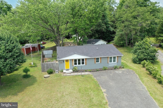 11487 Hg Trueman Rd, Lusby, MD 20657 - view of front of property with gravel driveway and roof with shingles
