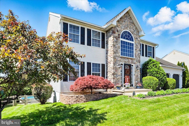 17 Shelly Dr, Reading, PA 19608 - view of front of property with stone siding and a front yard