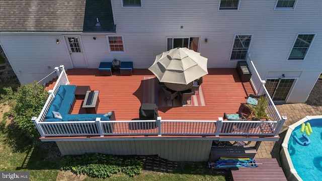 17 Shelly Dr, Reading, PA 19608 - rear view of house with a deck, an outdoor hangout area, and an outdoor pool