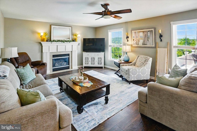 17 Shelly Dr, Reading, PA 19608 - living area featuring ceiling fan, dark wood-style flooring, a fireplace with flush hearth, and baseboards