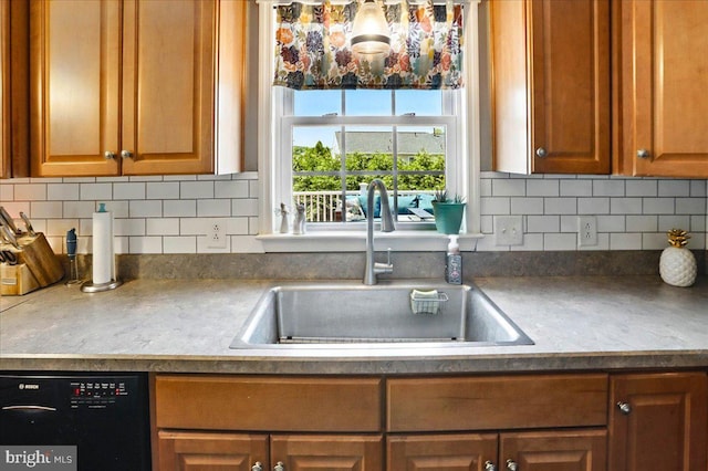17 Shelly Dr, Reading, PA 19608 - kitchen featuring a sink, dishwasher, and decorative backsplash