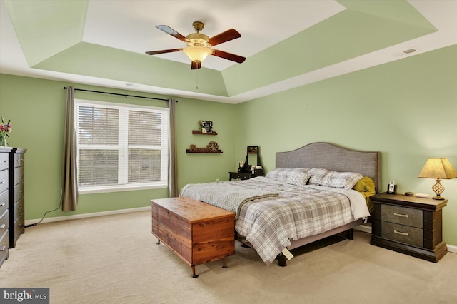 303 Brook Meadow Dr, Mechanicsburg, PA 17050 - bedroom with a tray ceiling, light colored carpet, baseboards, and ceiling fan