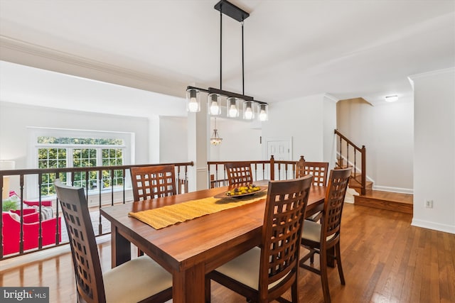 4410 S Pershing Ct, Arlington, VA 22204 - dining space with ornamental molding, hardwood / wood-style floors, baseboards, and stairway