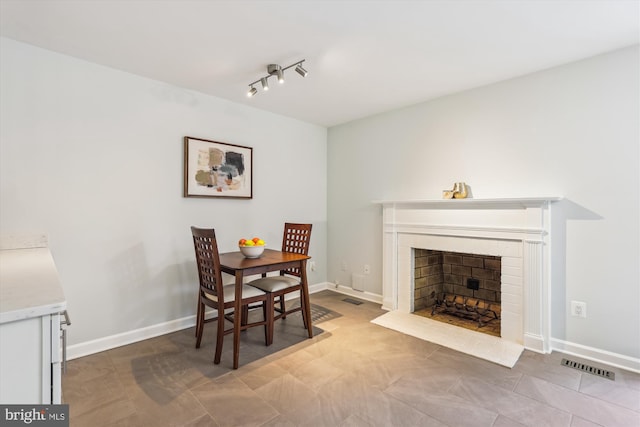 4410 S Pershing Ct, Arlington, VA 22204 - dining space with a fireplace with flush hearth and baseboards