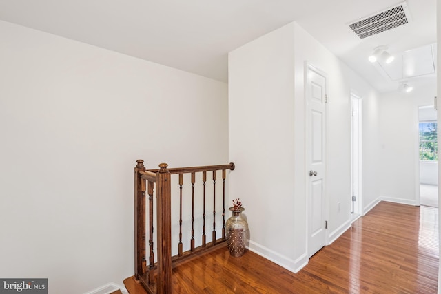 4410 S Pershing Ct, Arlington, VA 22204 - hallway featuring wood finished floors, attic access, and baseboards