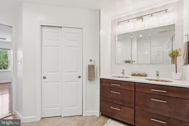 4410 S Pershing Ct, Arlington, VA 22204 - full bath featuring baseboards and double vanity